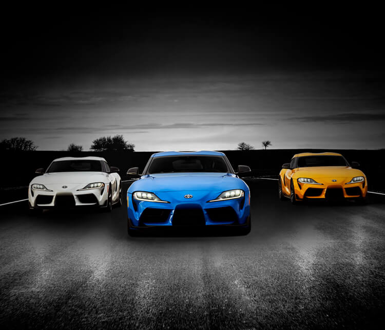 Three GR Supras on road